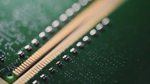 Macro Close Up of DDR4 RAM Gold Contacts with Shifting Colorful Light Stock Footage 344955923