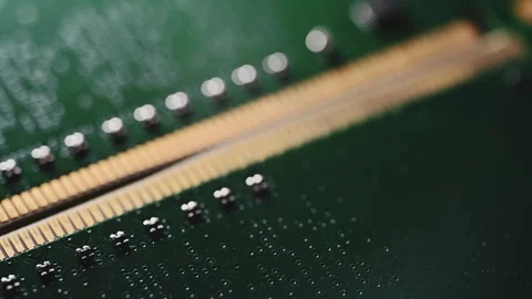 Macro Close Up of DDR4 RAM Gold Contacts with Shifting Colorful Light Stock Footage 344955940