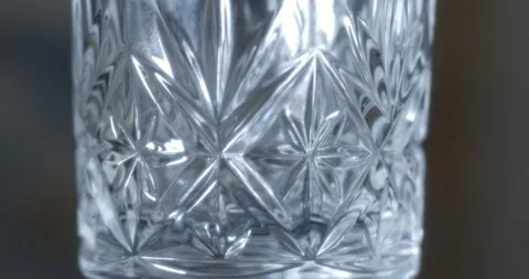 Macro Close Up of Decorative Crystal Whiskey Glass Stock Footage 261802041