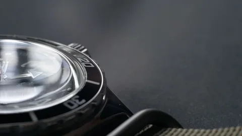 Macro close-up of a diving watch with focus on the second hand. The clock is Stock Footage 107531357