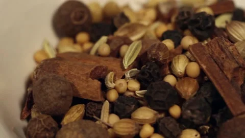 Macro close up dolly past white bowl of spice mix Stock Footage 156454826