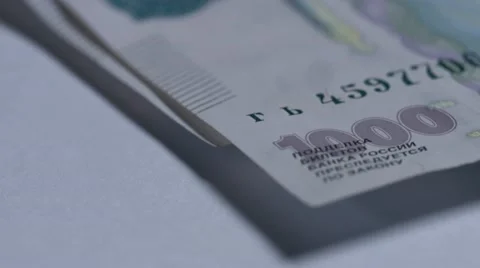 Macro close up dolly shot of the 1000 rubles  Video stock 60330244
