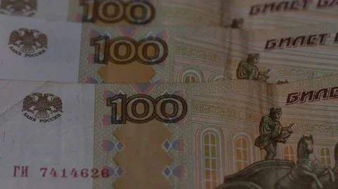 Macro close up dolly shot of  pile of rubles and united states dollar bills  Video stock 60341913