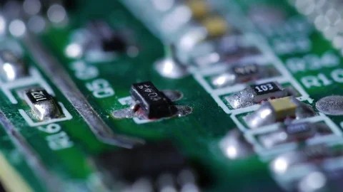 Macro close up of electronic chip with circuits rotating around 3 Vídeo Stock 70242407