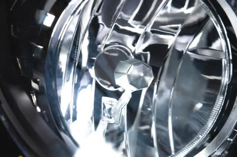 Macro close-up element of reflector of new car headlight headlight. Car Stock Photos