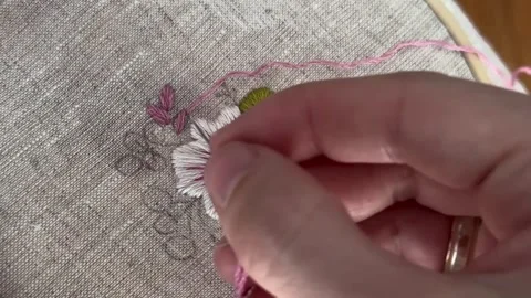 Macro close up of embroidery stitches on fabric, textile detail Stock Footage 335193784