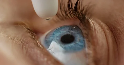 Macro close up eye drops medicine for allergy healthy eyesight clarity concept Stock Footage 96948922