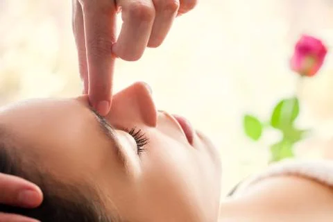 Macro close up of facial relaxing  massage. Stock Photos