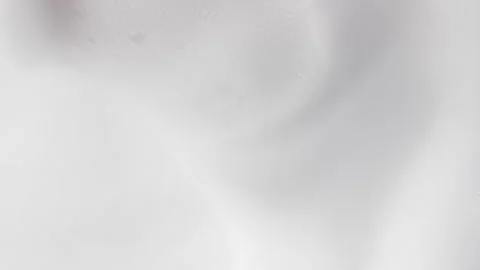 Macro close-up of female hands playing with soft soap foam and bubbles in b.. Stock Footage 317317045