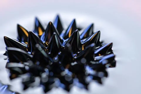 Macro close-up of ferrofluid. Red and blue. Fotos Stock