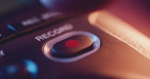 Macro close up of finger pressing record button on audio device Stock Footage 152748860