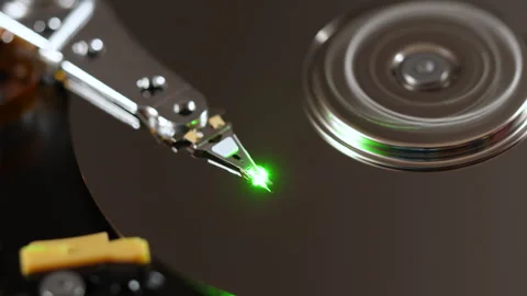 Macro Close Up Footage of Head of Hard Disk that Reads Information From Media Stock Footage 242492520