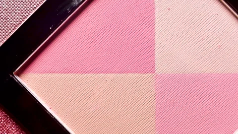 Macro Close-Up of Four Rotating Colored Eye Shadows Stock Footage 256156368