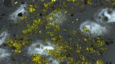 Macro close up of Golden Wet Glitter Particles of acrylic paint and oil. Stock-Footage 150575100