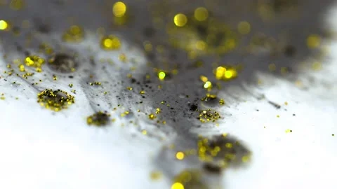 Macro close up of Golden Wet Glitter Particles of acrylic paint and oil. Stock Footage 150575454