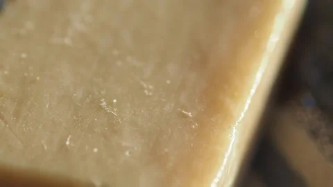 Macro close up of hard cheese texture with crystallized salt and waxy surfa.. Stock Footage 332545898