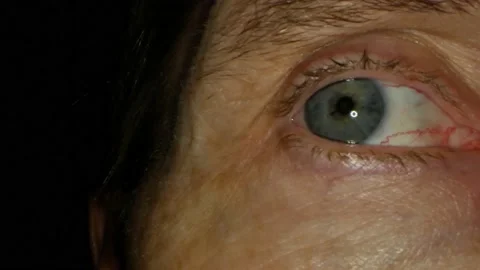 Macro close-up human grey and blue eye looking nervous Vídeos de archivo 221830707