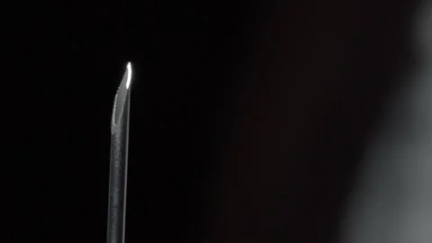 Macro Close Up of Hypodermic Needle Tip with Sharp Bevel for Medical Injection Stock Footage 340192992