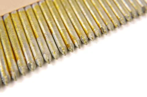 Macro close up of  industrial construction nails  isolated Stock-Fotos