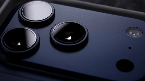 Macro Close-Up of iPhone 17 Pro in Deep Blue Color with Triple Camera Lenses and Stock Footage 318056632