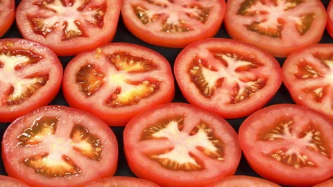 Macro Close Up of Juicy Red Tomato Slices Texture Video stock 342773393