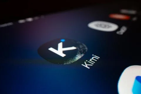Macro close up of Kimi AI app icon on smartphone screen Stock Photos