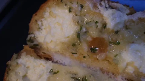 Macro Close-Up of Korean Cream Cheese Garlic Bread Split Open - Savory Food Stoc Видео 343587580
