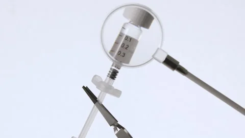 Macro Close-Up of Laboratory Syringe Stock Footage 317496312