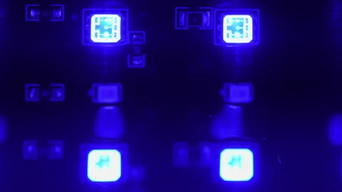 Macro close up of led light emitting diode light. Semiconductor device prod.. Stockbeeldmateriaal 338298680