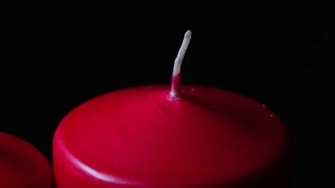 Macro close up lighting a candle rotating around black background 2 Video stock 70244719