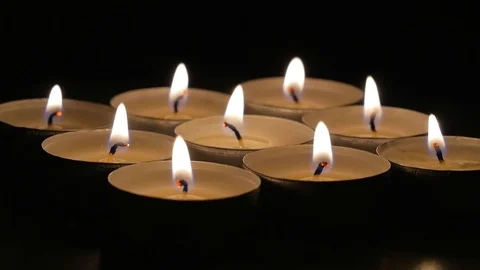 Macro close up of lit candles rotating around 2 Video stock 70245104