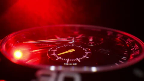 Macro close-up of a luxury chronograph watch dial illuminated with dra Stock-Footage 326860942