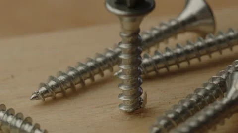 Macro close up of Metal screw drilled into wooden beam Stock Footage 261129224