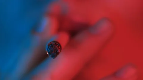 Macro close up of mouth and lips of female young smoker and Smoking cigarette Stock Footage 125188875
