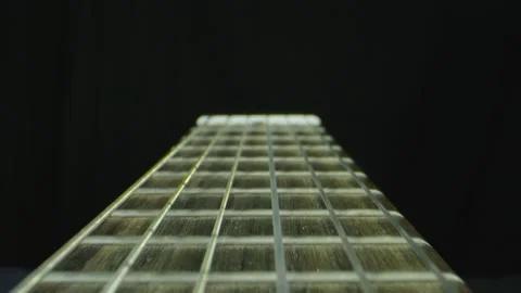 Macro close up of neck and strings of Guitalele Stock Footage 130596276