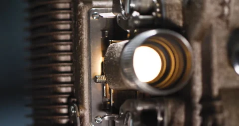 Macro close up of an old vintage analog 8mm projector playing an 8mm film Vídeo Stock 249162492