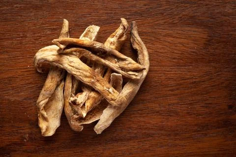 Macro close-up of Organic dried mango slices (Mangifera indica) or amchoor on Stock Photos