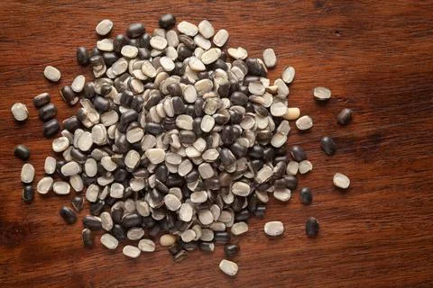 Macro Close up of Organic split black urad dal (Vigna mungo) with shell clean Stock Photos