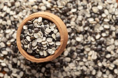 Macro Close up of Organic split black urad dal (Vigna mungo) with shell  in a Stock Photos
