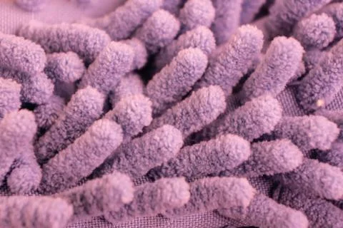 Macro close up of pink chenille microfiber texture for cleaning, trapping dus Stock Photos