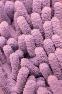 Macro close up of pink chenille microfiber texture for cleaning, trapping dus Stock Photos