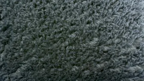 Macro close up of plush gray sherpa fabric texture showing soft sustainable f Stock Photos