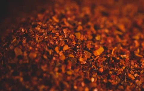 Macro close up portrait of organic crashed  dry chile , studio lighting, sele Stock Photos