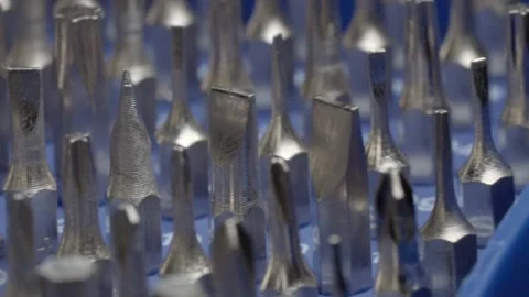 Macro close up of precision screwdriver bits arranged in storage case for Stock Footage 340810636