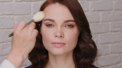 Macro Close Up of Professional Makeup Artist Applying Eyeshadow on Model Eyelid Stock Footage 327790049