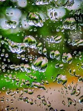 Macro Close-Up of Rain Drops on Window Glass Stock Photos