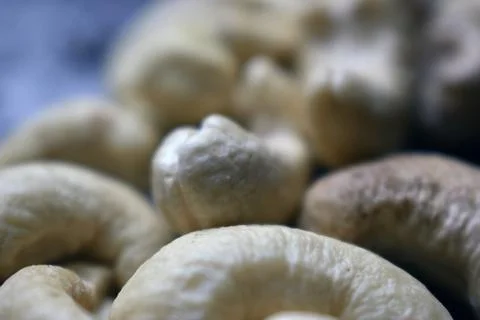 Macro Close Up of Raw Whole Cashew Nuts as Healthy Organic Vegan Snack Stock Photos