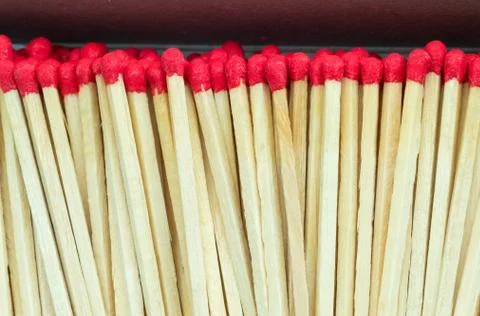 Macro close up of Red headed matches standing upright Stock Photos