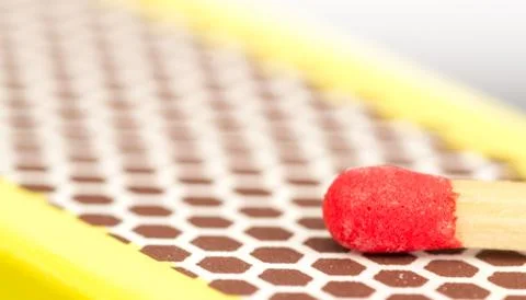 Macro close up of a red match head Stock Photos