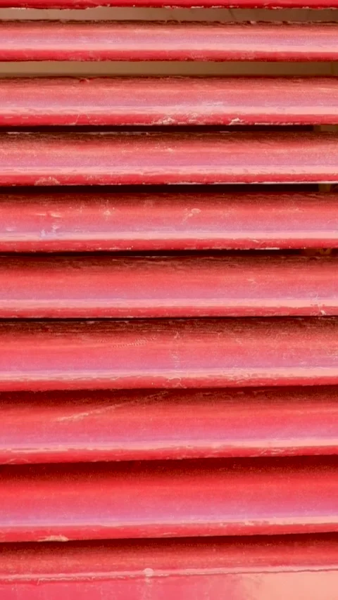 Macro close red window shades.Close angle window shades. Stock Footage 297627242